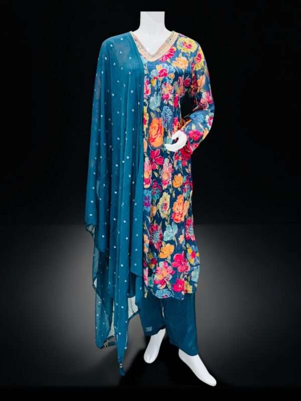 Vibrant Teal Floral Suit Set with Embroidered Neckline and Sheer Dupatta
