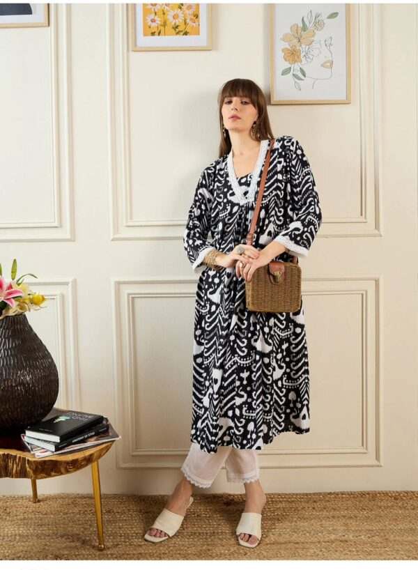 Chic Black and White Printed Dress with Lace Details