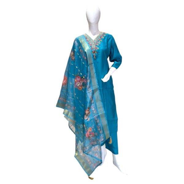 Elegant Blue Salwar Suit with Floral Dupatta and Embroidered Neckline