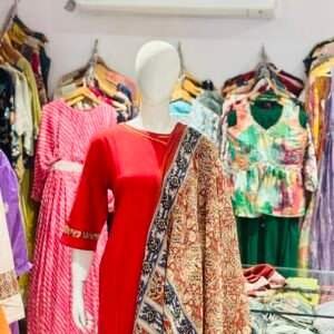 red kurta set with a printed dupatta