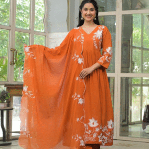 orange Anarkali suit set with white embroidery and a matching dupatta.