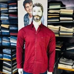 SPYKAR red-colored men's shirt paired with blue jeans