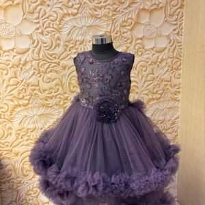 purple child's party dress featuring a sequined and floral-embellished frock