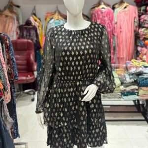 black mini dress with gold embellishments