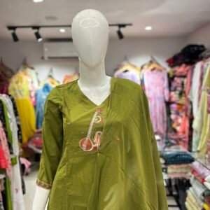 green three-piece indian ethnic