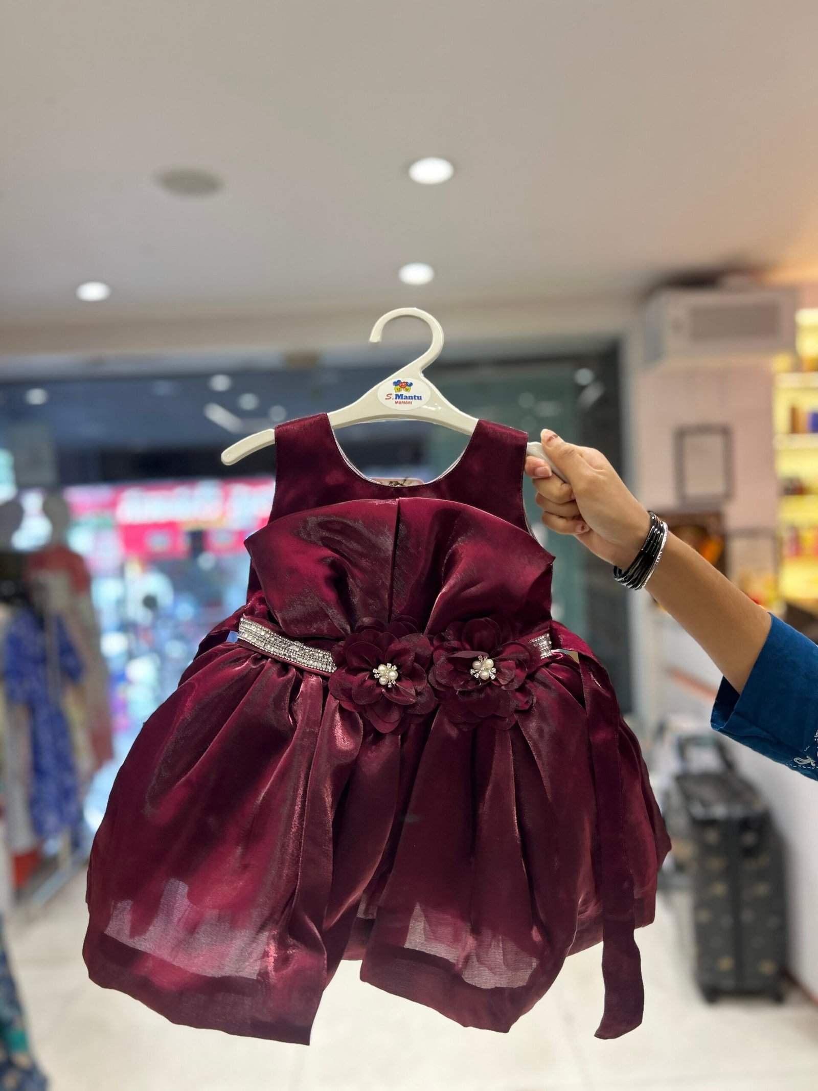 wine-colored fit and flare dress for a baby girl
