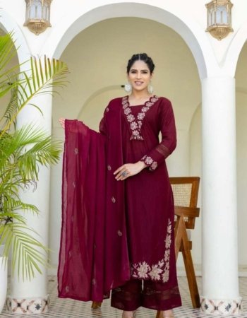 maroon embroidered kurta set with a matching dupatta