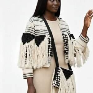  black and white chunky knit fringed jacket and a matching crossbody bag