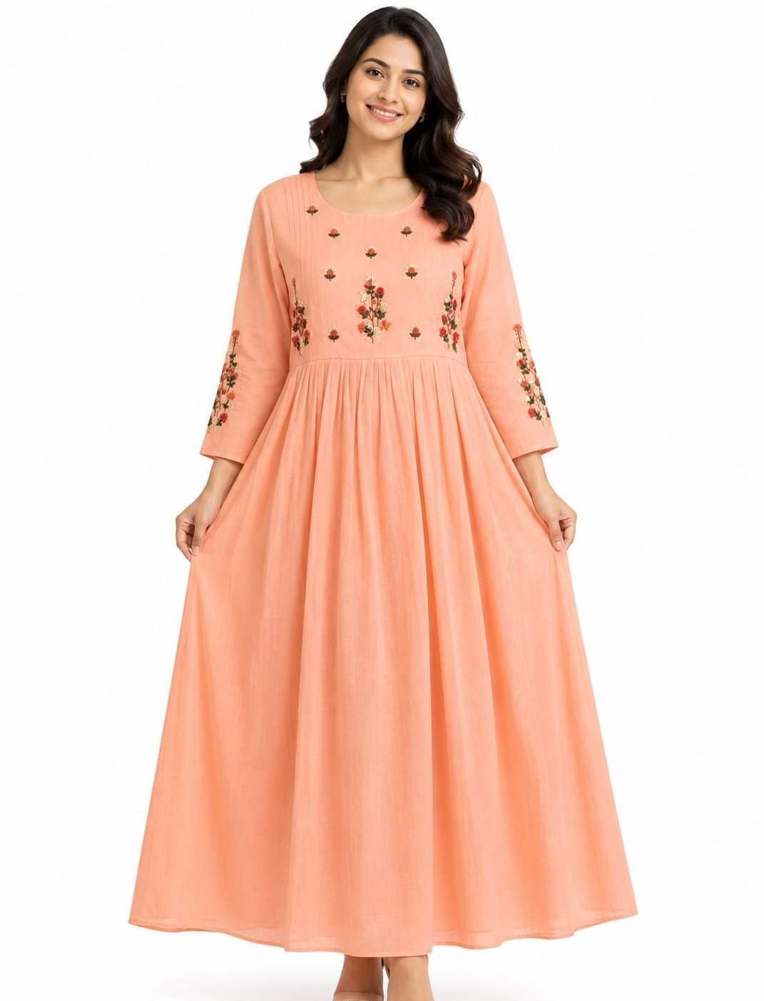 Shop Peach Floral Frock for Women with delicate floral detailing, 3/4 sleeves and a flowy long silhouette. Perfect for festive and casual occasions.